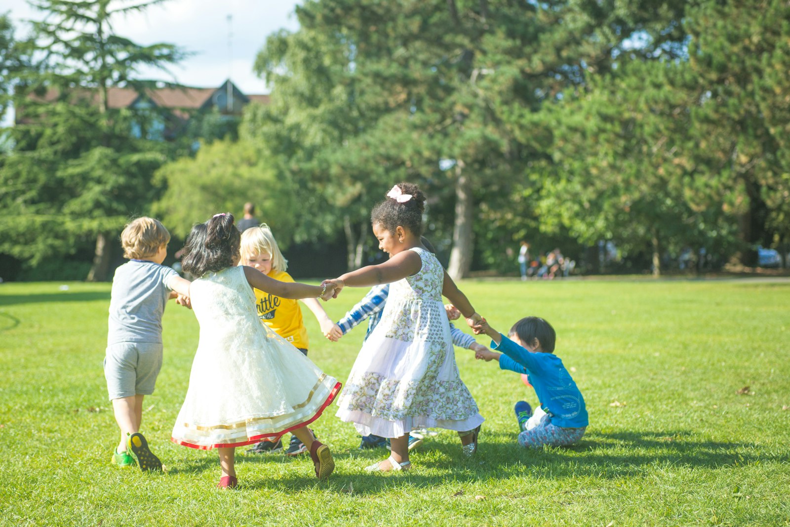 Children at a licensed child care center playing together outdoors